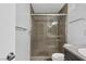 Bathroom features tile floors, glass enclosed shower, and updated fixtures at 7950 W Flamingo Rd # 2056, Las Vegas, NV 89147