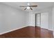Bedroom features hardwood floors, ceiling fan, and closet at 7950 W Flamingo Rd # 2056, Las Vegas, NV 89147