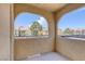 Exterior patio featuring an arch and view of other units in community at 7950 W Flamingo Rd # 2056, Las Vegas, NV 89147
