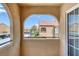 View from the covered patio showcasing community buildings and parking at 7950 W Flamingo Rd # 2056, Las Vegas, NV 89147