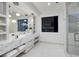Elegant bathroom featuring double sinks, a marble countertop, and modern fixtures at 1 Boulderback Dr, Henderson, NV 89012