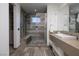 Beautiful bathroom featuring a glass-enclosed shower with a built-in bench and stylish tile work at 1 Boulderback Dr, Henderson, NV 89012