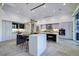 Bright open kitchen with seating island and stainless steel appliances at 1 Boulderback Dr, Henderson, NV 89012