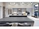 Stunning kitchen with stainless steel appliances, expansive island, and sleek modern design at 1 Boulderback Dr, Henderson, NV 89012
