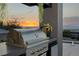 Stainless steel grill and prep area with sunset view at 1 Boulderback Dr, Henderson, NV 89012