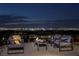 Night view of patio with city view at 1 Boulderback Dr, Henderson, NV 89012