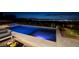 Night view of modern pool and spa at 1 Boulderback Dr, Henderson, NV 89012