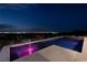 Night view of modern pool and spa at 1 Boulderback Dr, Henderson, NV 89012