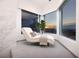 Relaxing sitting area with a chaise lounge, large windows, and a scenic view at 1 Boulderback Dr, Henderson, NV 89012