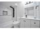 Updated bathroom with marble tile and modern fixtures at 1701 E Katie Ave # 10, Las Vegas, NV 89119