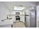 Modern kitchen with stainless steel appliances at 1701 E Katie Ave # 10, Las Vegas, NV 89119