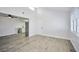 Open living room and kitchen with wood-look floors at 1701 E Katie Ave # 10, Las Vegas, NV 89119