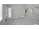 Open living area featuring a fireplace and laminate floors at 1701 E Katie Ave # 32, Las Vegas, NV 89119