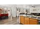 Open kitchen with island, granite countertops, and stainless steel appliances at 2134 Dillons Cove Dr, Laughlin, NV 89029