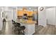 Modern kitchen with light wood cabinets, granite counters, and stainless steel appliances at 2134 Dillons Cove Dr, Laughlin, NV 89029