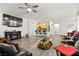 Open living room and kitchen with hardwood floors and ceiling fan at 2134 Dillons Cove Dr, Laughlin, NV 89029
