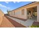 Pathway and landscaping beside home, leading to backyard at 2134 Dillons Cove Dr, Laughlin, NV 89029