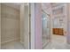An ensuite bathroom features a glass enclosed shower, and a separate closet at 29 Desert Highlands Dr, Henderson, NV 89052