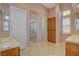Bathroom featuring a shower and granite counters at 29 Desert Highlands Dr, Henderson, NV 89052