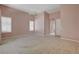 A primary bedroom features carpeted floors, ceiling fan, and shuttered windows at 29 Desert Highlands Dr, Henderson, NV 89052
