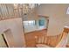 Elegant foyer featuring high ceilings, chandelier, and hardwood floors at 29 Desert Highlands Dr, Henderson, NV 89052