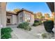 Inviting entryway with stonework and a decorative door at 29 Desert Highlands Dr, Henderson, NV 89052