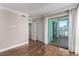 Bedroom with hardwood floors and access to balcony at 322 Karen Ave # 3808/3804, Las Vegas, NV 89109