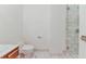 Clean bathroom with a toilet and marble shower at 4471 Dean Martin Dr # 507, Las Vegas, NV 89103