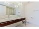 Elegant bathroom with double vanity and chandelier at 4471 Dean Martin Dr # 507, Las Vegas, NV 89103