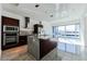 Modern kitchen with granite counters, stainless steel appliances, and an island at 4471 Dean Martin Dr # 507, Las Vegas, NV 89103