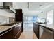 Modern kitchen with stainless steel appliances and granite countertops at 4471 Dean Martin Dr # 507, Las Vegas, NV 89103