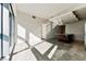 Open concept living room with kitchen island and city views at 4471 Dean Martin Dr # 507, Las Vegas, NV 89103