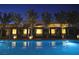 Inviting pool area with private cabanas and night lighting at 4471 Dean Martin Dr # 507, Las Vegas, NV 89103
