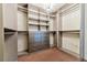 Large walk-in closet featuring built-in shelving and drawers at 4471 Dean Martin Dr # 507, Las Vegas, NV 89103