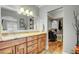 Bathroom includes double vanity, granite countertops and walk-in closet at 5100 Jordan Frey St # 203, Las Vegas, NV 89130