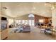 Spacious clubhouse interior with seating areas and kitchen at 5100 Jordan Frey St # 203, Las Vegas, NV 89130