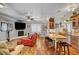 Open floor plan with hardwood floors, a fireplace, and kitchen island at 5100 Jordan Frey St # 203, Las Vegas, NV 89130