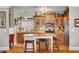 Gourmet kitchen with granite countertops and custom wood cabinetry at 5100 Jordan Frey St # 203, Las Vegas, NV 89130