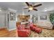 Open living area with hardwood floors and a view into the kitchen at 5100 Jordan Frey St # 203, Las Vegas, NV 89130
