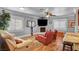 Spacious living room featuring hardwood floors and a cozy fireplace at 5100 Jordan Frey St # 203, Las Vegas, NV 89130