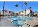 Community pool and spa with surrounding patio furniture at 5100 Jordan Frey St # 203, Las Vegas, NV 89130