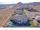 Custom home featuring a backyard oasis with sparkling pool at 5790 Aspen Falls Cir, Las Vegas, NV 89149