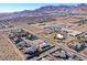 Expansive aerial view of a luxury home community with mountain views and spacious lots at 5790 Aspen Falls Cir, Las Vegas, NV 89149