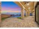 Gorgeous backyard with lush landscaping, covered patio, and a sparkling swimming pool at 5790 Aspen Falls Cir, Las Vegas, NV 89149