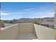 Outdoor balcony with tile flooring offers mountain views at 5790 Aspen Falls Cir, Las Vegas, NV 89149