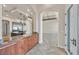 Elegant foyer featuring high ceilings, arched doorways, and marble countertops, creating a luxurious entrance at 5790 Aspen Falls Cir, Las Vegas, NV 89149