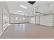 Spacious three-car garage, featuring multiple doors and ample room for storage at 5790 Aspen Falls Cir, Las Vegas, NV 89149