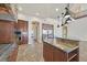 Spacious gourmet kitchen features granite counters, stainless appliances, and custom island at 5790 Aspen Falls Cir, Las Vegas, NV 89149