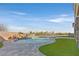 Lush backyard featuring a swimming pool, and desert views at 5790 Aspen Falls Cir, Las Vegas, NV 89149