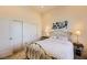 Cozy bedroom with white walls and sliding door closets at 673 Assurance Pl, Henderson, NV 89011